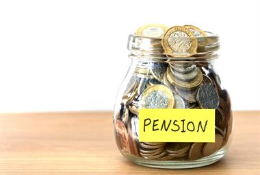 Jar labelled pension containing pound coins