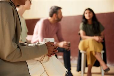 Group of people sharing problems as therapy