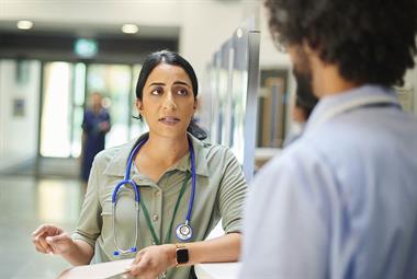 Doctor talking to a colleague