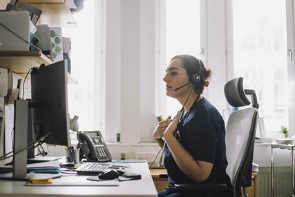 Female doctor on a video call with a patient