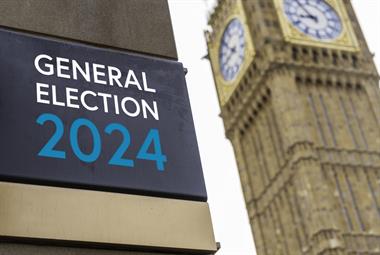 Sign saying 'general election 2024' next to Houses of Parliament