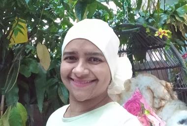 Dr Shahnaz Camatchee surrounded by her indoor plants